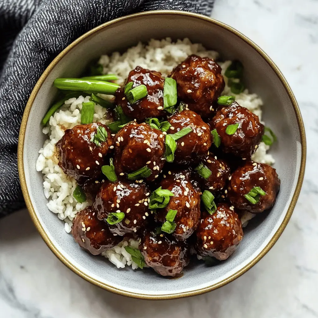 Whip up a delicious batch of 30-minute Mongolian Beef Meatballs for a quick and satisfying meal! These tender meatballs are packed with flavor from soy sauce, ginger, and garlic, making them perfect for busy weeknights or casual gatherings. Save this recipe for your next family dinner or potluck—you'll want to come back to these juicy bites again and again!