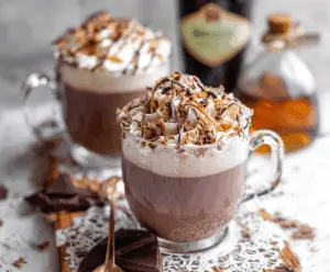 A cozy mug of Baileys Hot Chocolate topped with whipped cream and chocolate shavings, perfect for winter evenings.
