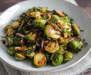 Delicious roasted Brussels sprouts drizzled with balsamic glaze, perfect for a healthy side dish.