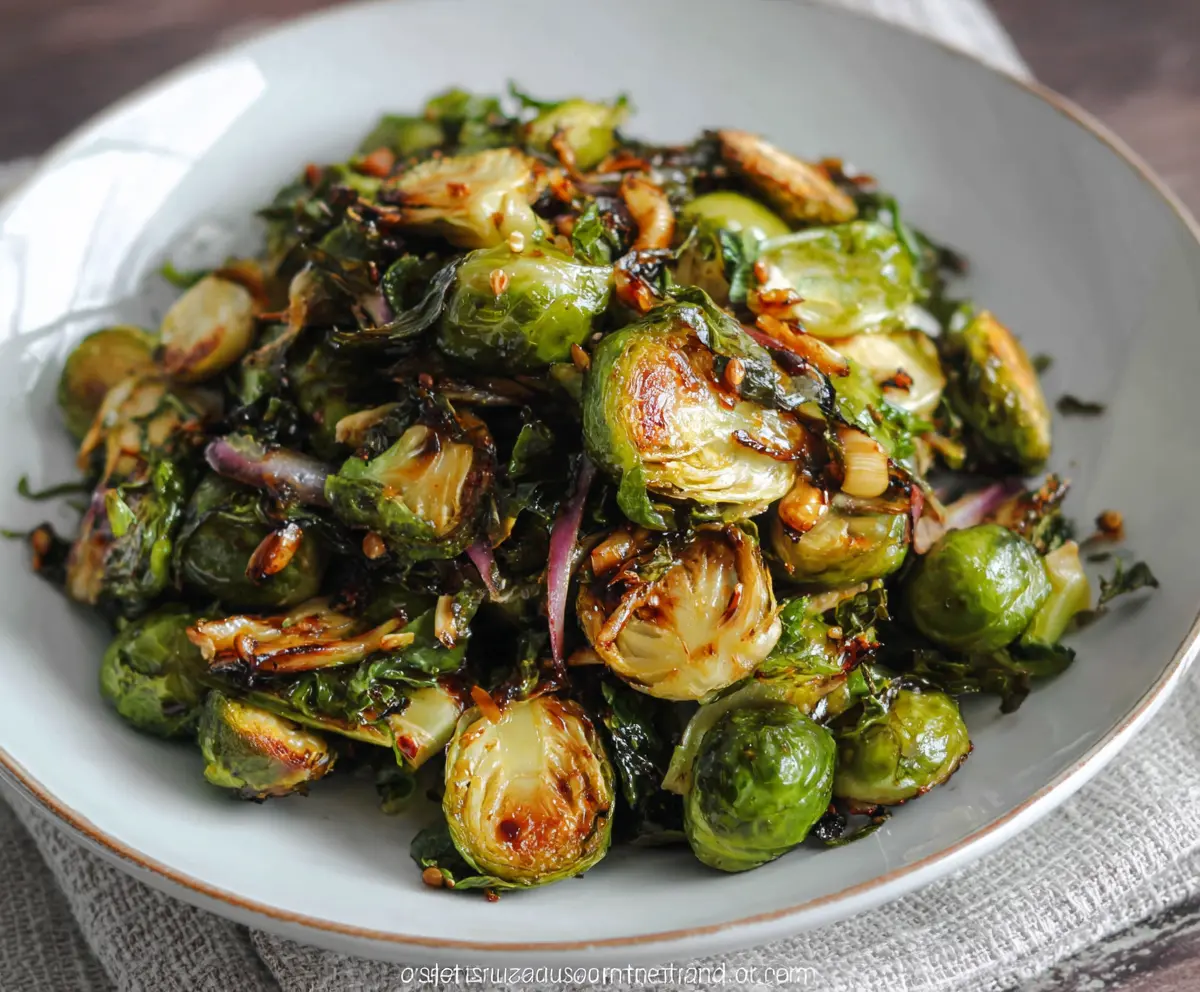 Delicious roasted Brussels sprouts drizzled with balsamic glaze, perfect for a healthy side dish.