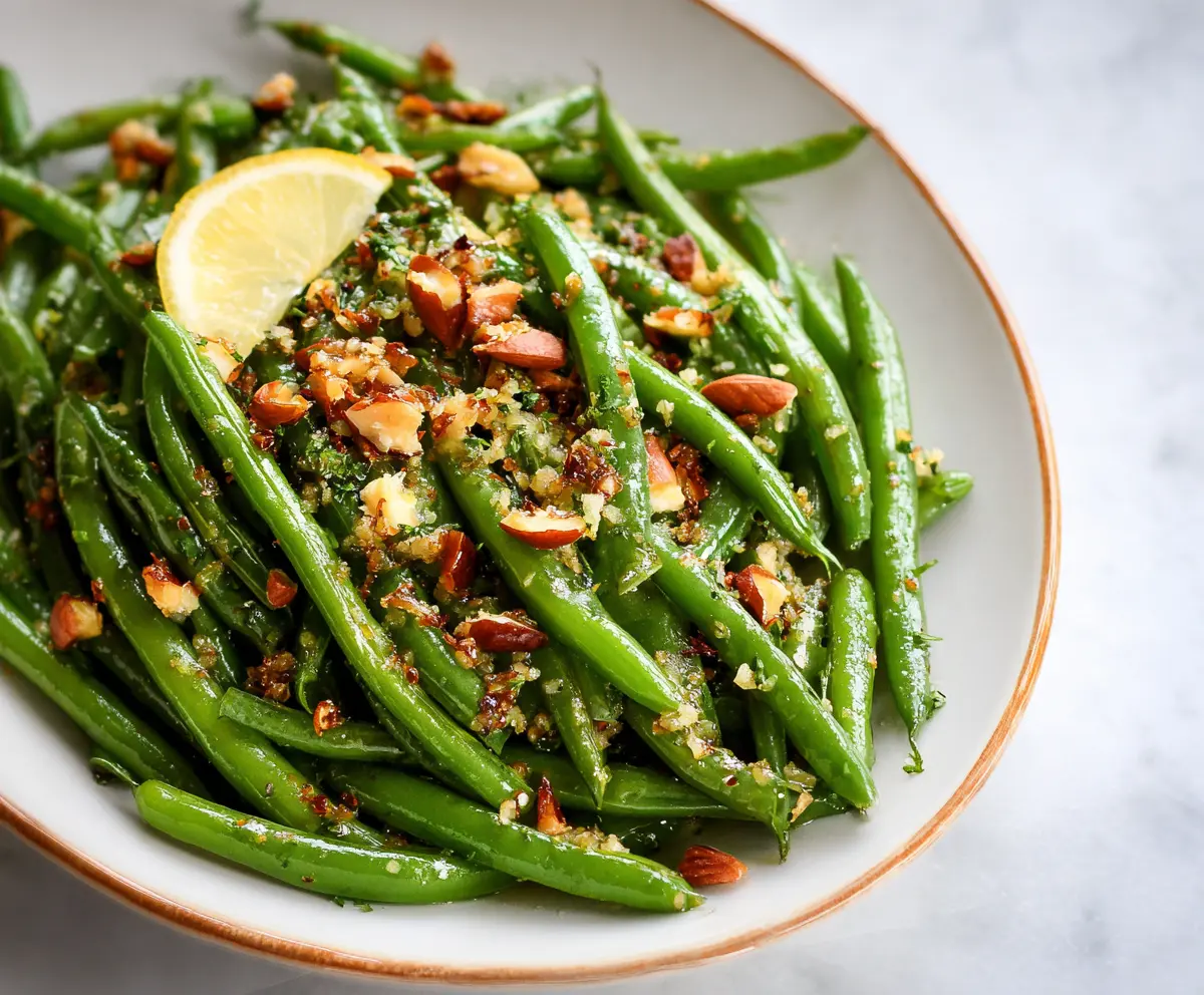 Fresh green beans cooked with Dijon mustard for a flavorful side dish.