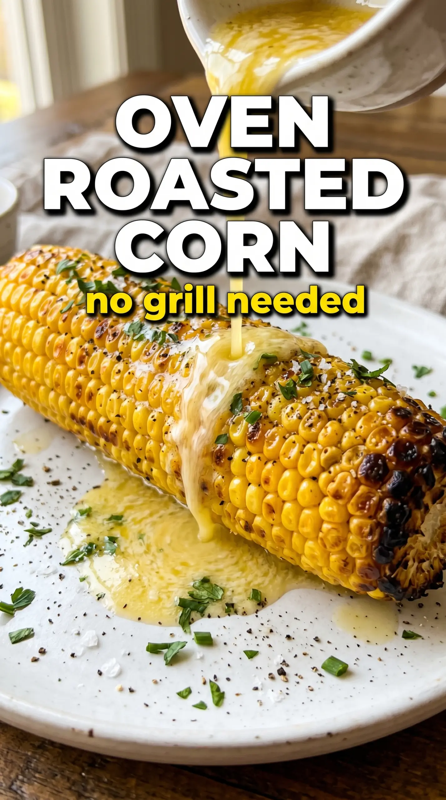 Oven roasted corn on the cob with blistered kernels and herb butter