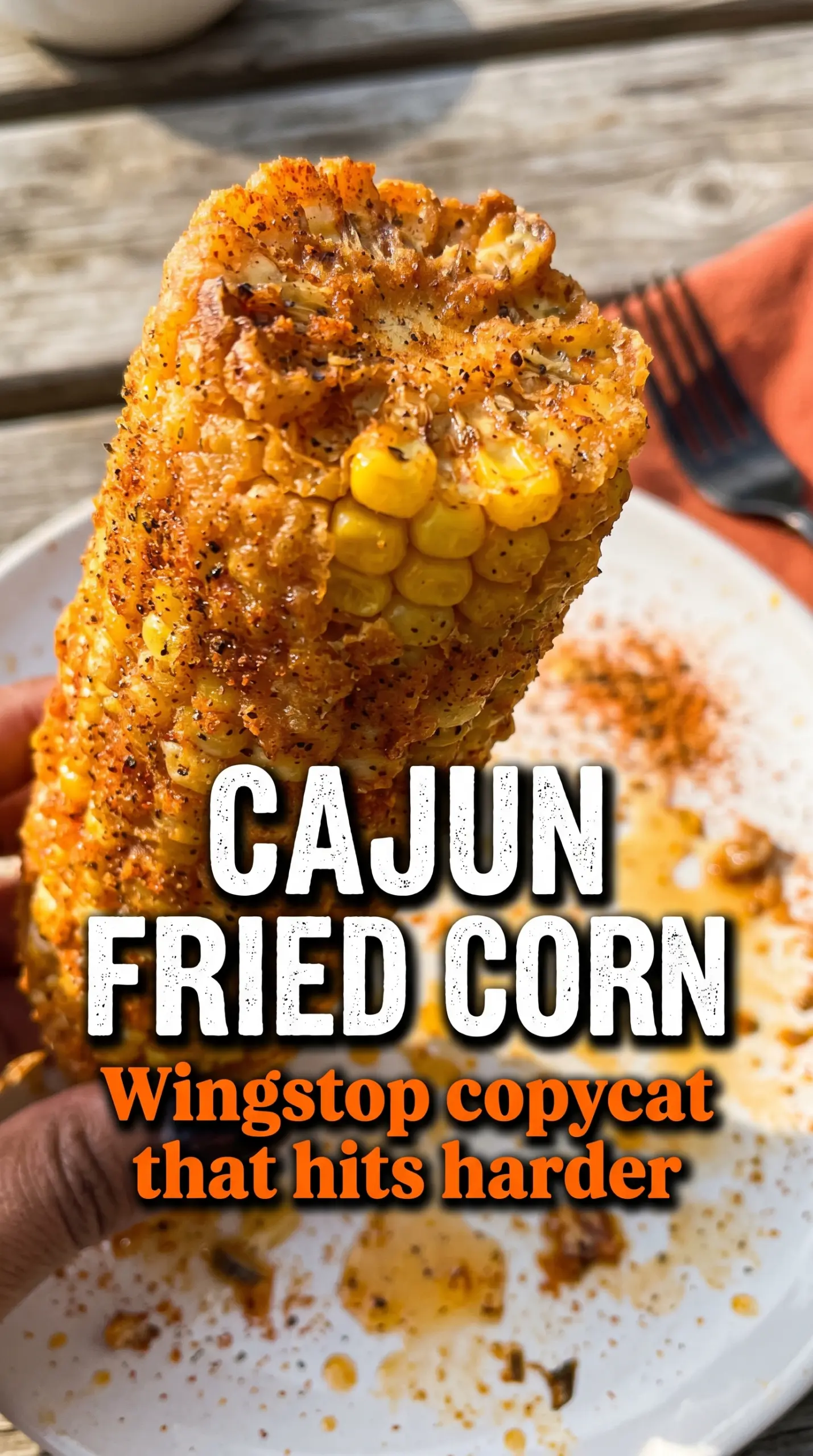 Cooked corn on the cob with toppings